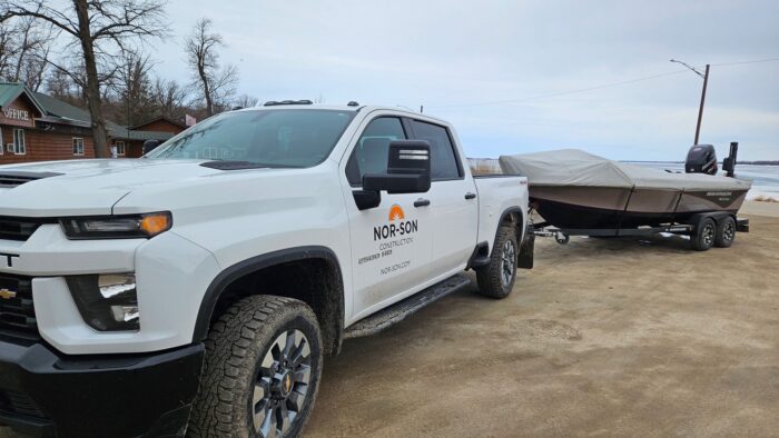 Nor-Son truck pulling boat at Fishing with Vets service day